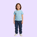 A child wears the constellation Youth Sensory Friendly Fidget Jogger.