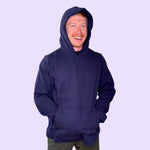 An adult wears the navy Adult Marble Maze Fidget Hoodie from Sense-ational You.