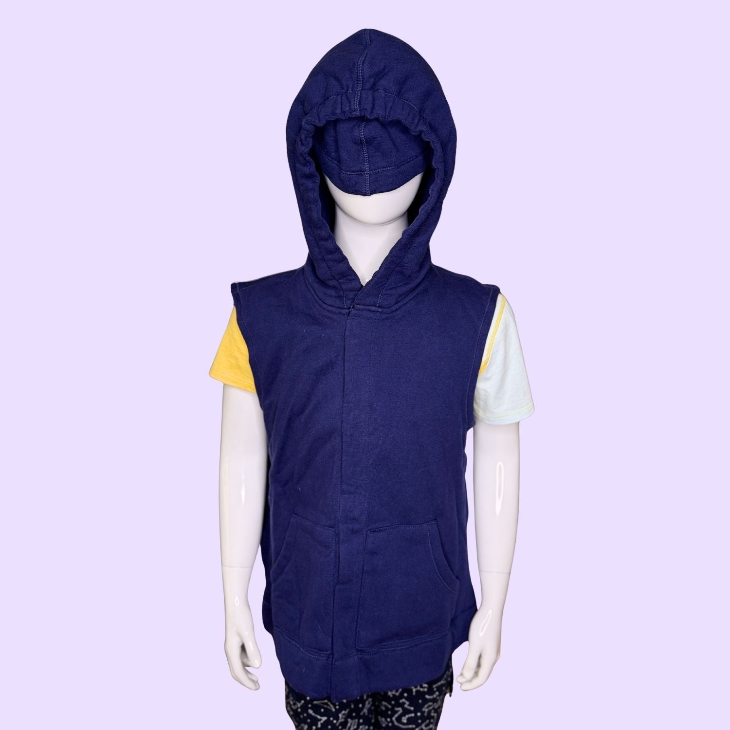 The Navy QuietSense™ Youth Sensory Sound Reducing Vest with the eye mask pulled down.