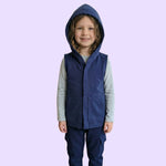 The NavyQuietSense™ Youth Sensory Sound Reducing Vest with the hood pulled up.