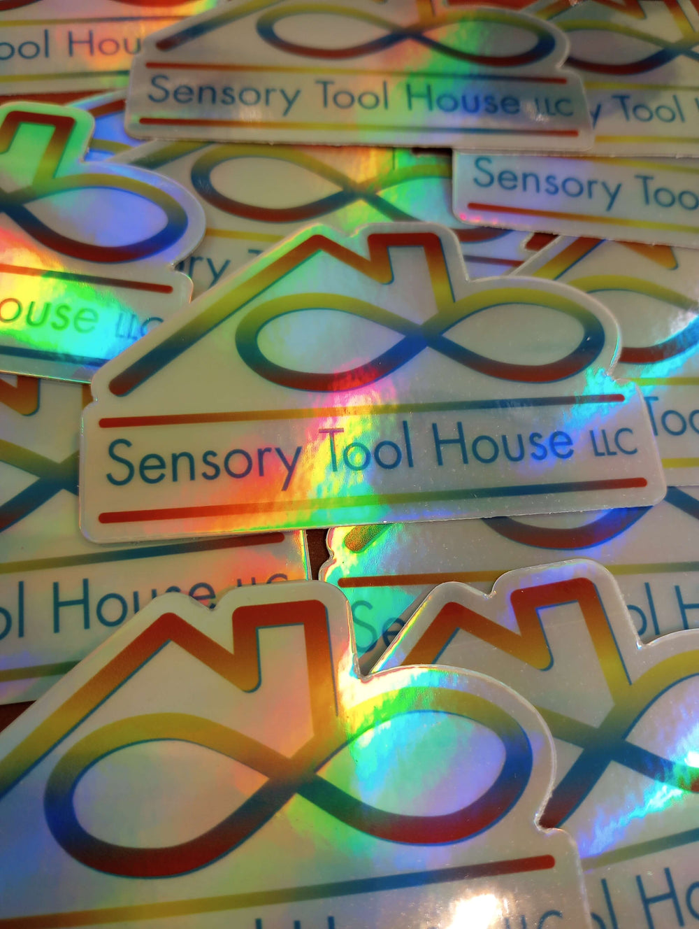 The holographic Sensory Tool House sticker.