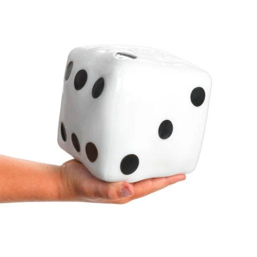 A hand with light skin tone holds up the Giant Dice Stress Ball.