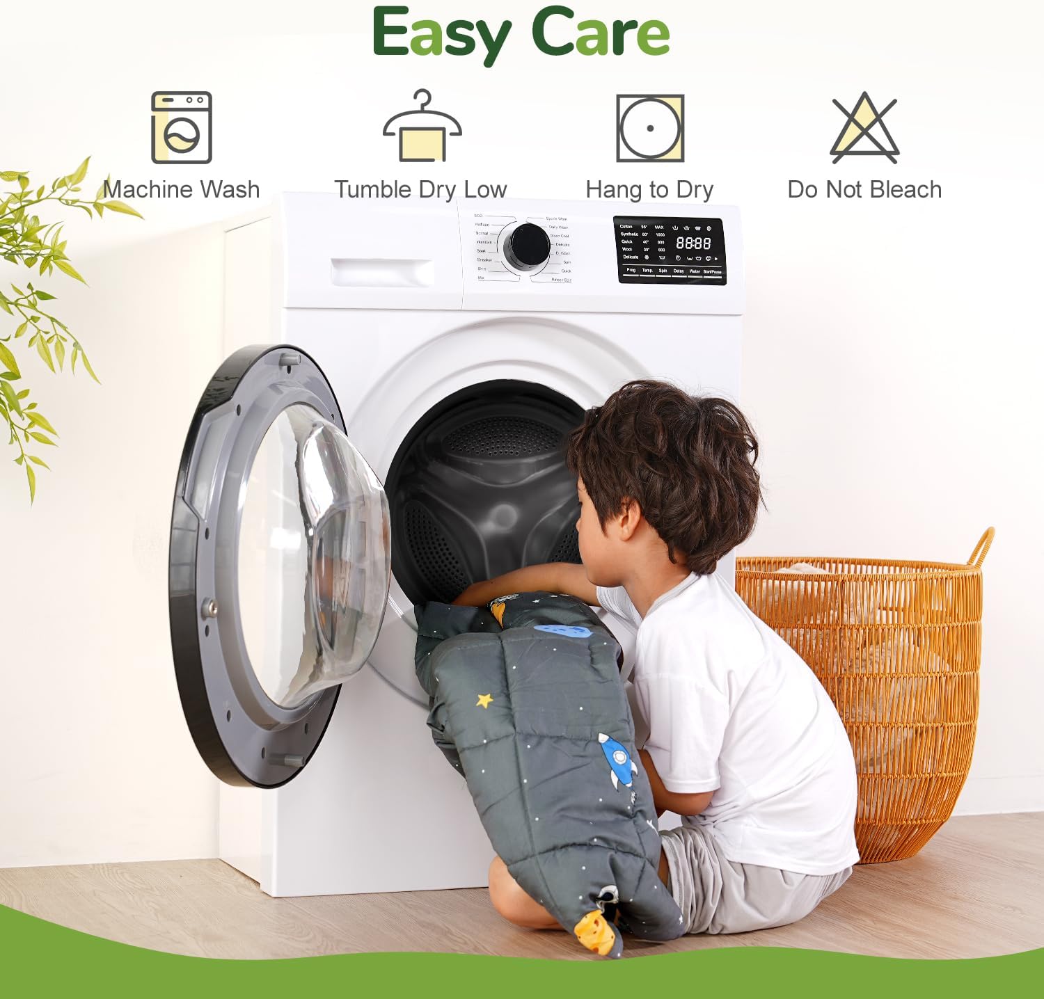 A child pulls the Space Grey Washable Cooling Weighted Blanket out of the washer.