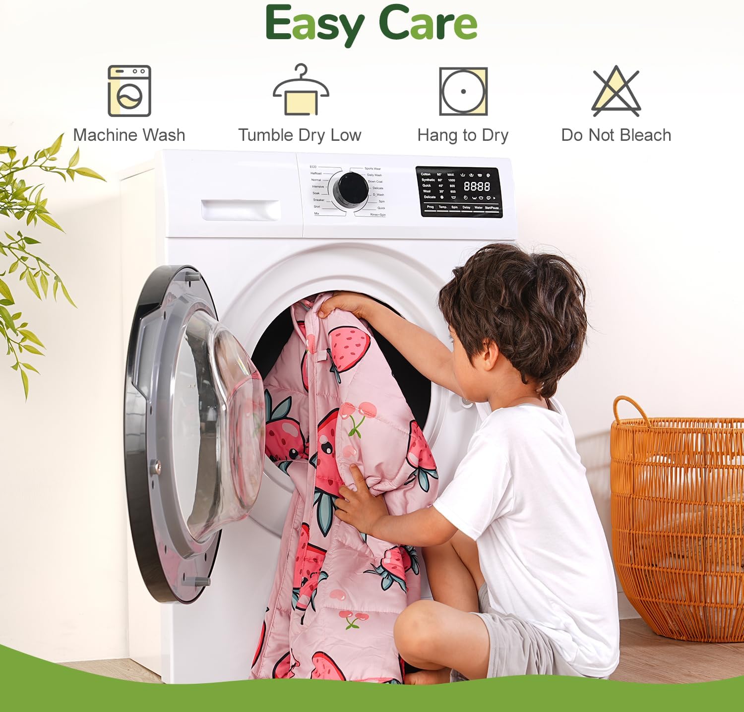 A child pulls the 
Strawberry Washable Cooling Weighted Blanket for Kids - 5 lb out of the dryer.