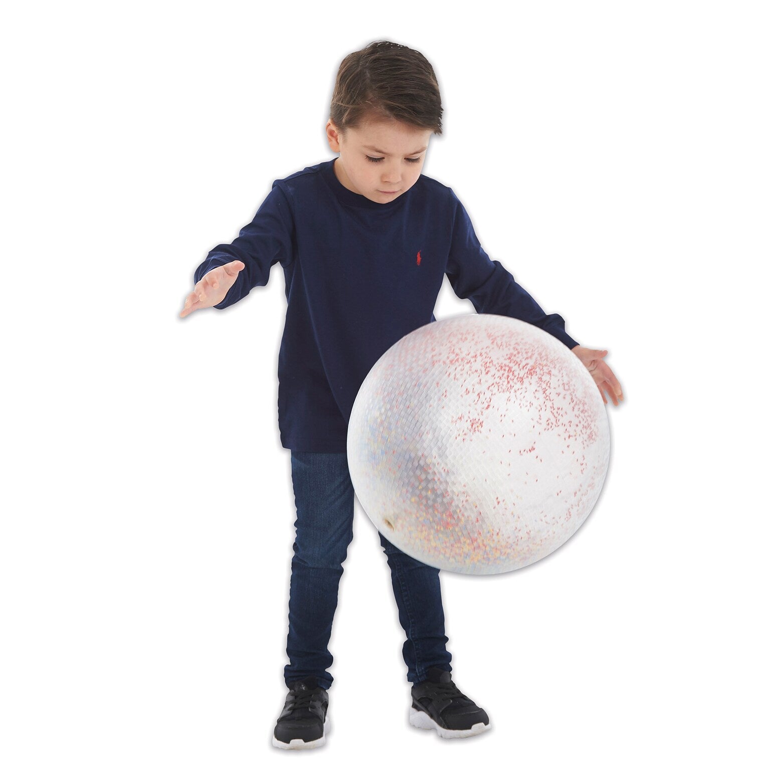 A child with light skin tone and short brown hair is bouncing the Constellation Sensory Ball.