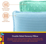 A look at the different tactile sides of the pillow: one is a sensory minky dot, and the other is a sensory stripe.