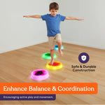 A child walks across a line of Special Supplies Round Liquid Gel LED Stepping Stones - 4-pack.