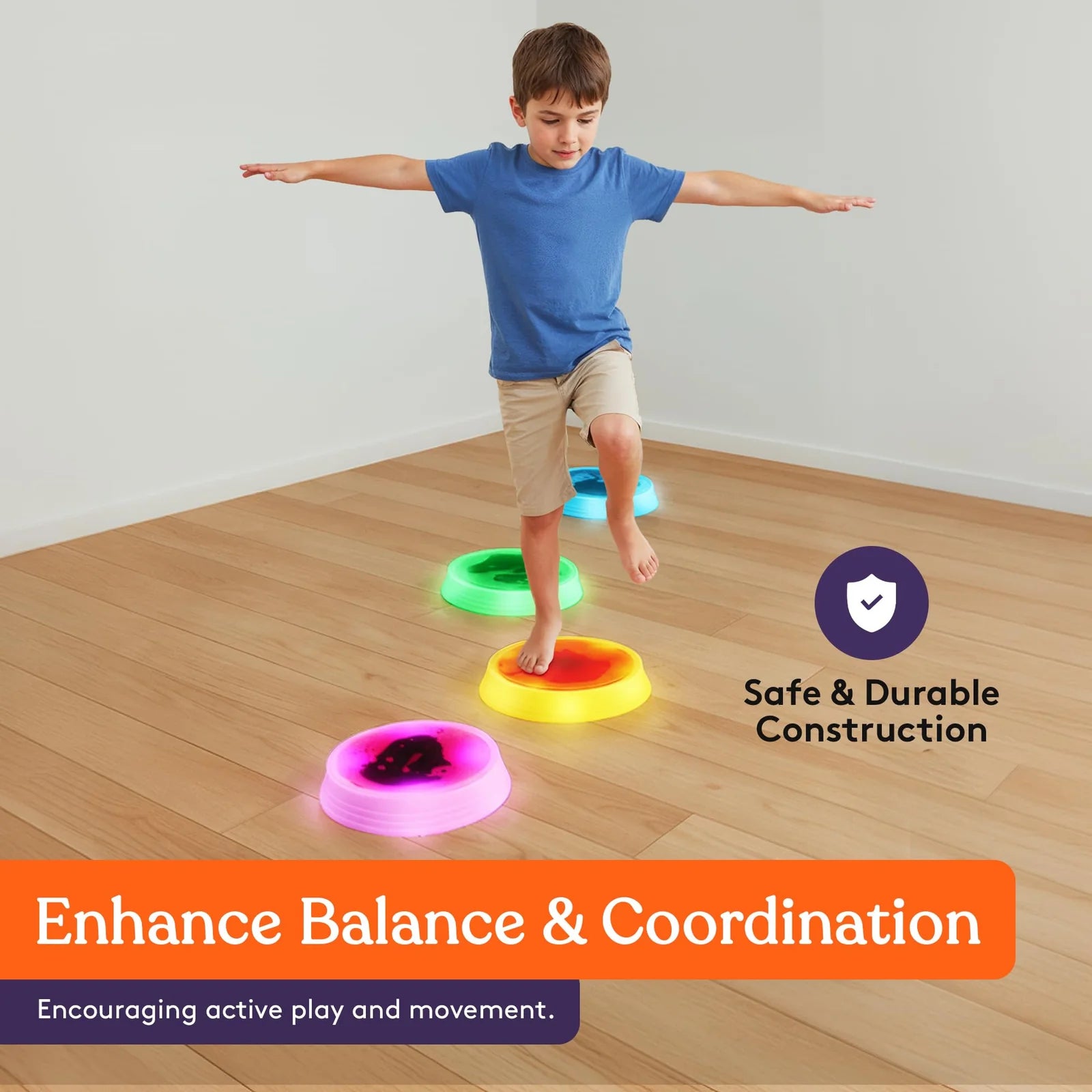 A child walks across a line of Special Supplies Round Liquid Gel LED Stepping Stones - 4-pack.