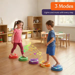 Two children move towards each other on the Musical LED Stepping Stones.