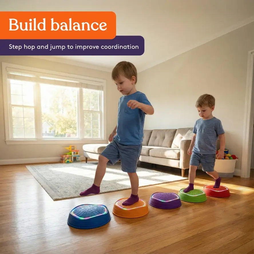 Two children walk in the same direction on the Musical LED Stepping Stones.