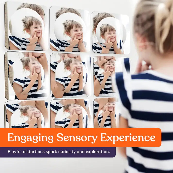A child makes a funny face at a formation of 9 Sensory Bubble Wall Mirrors.