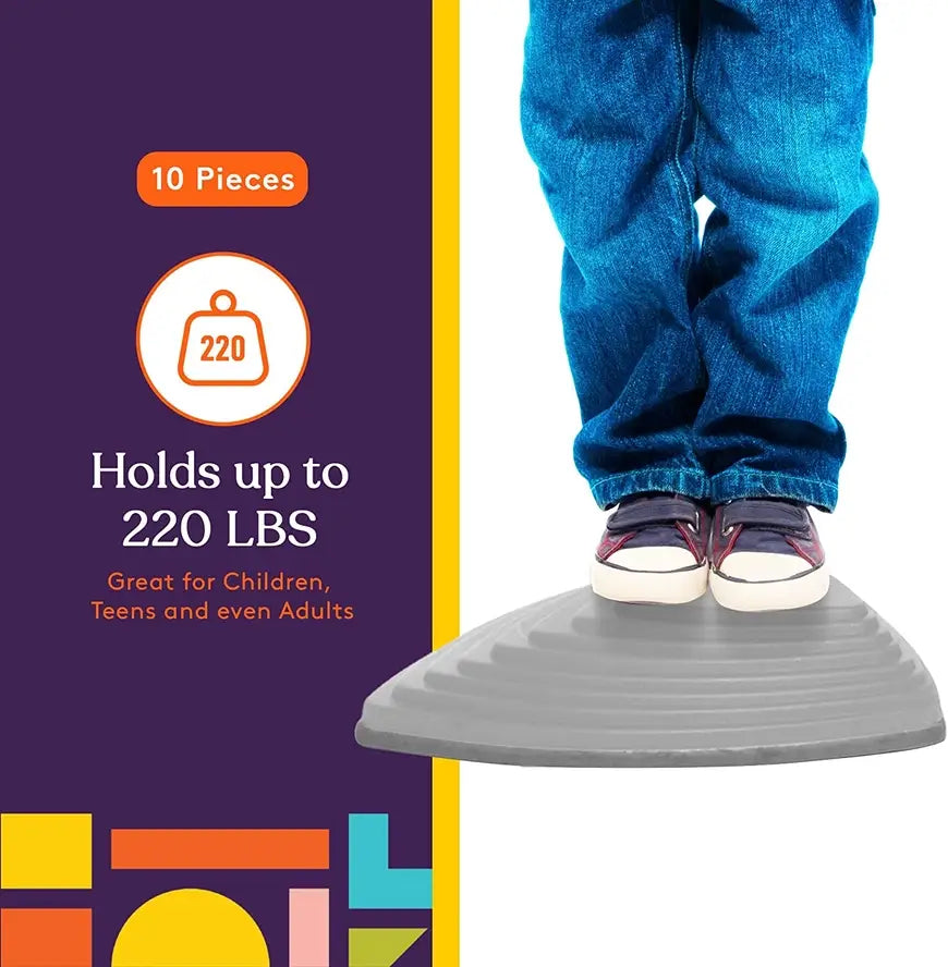 A child stands on top of a large Stepping Stone.