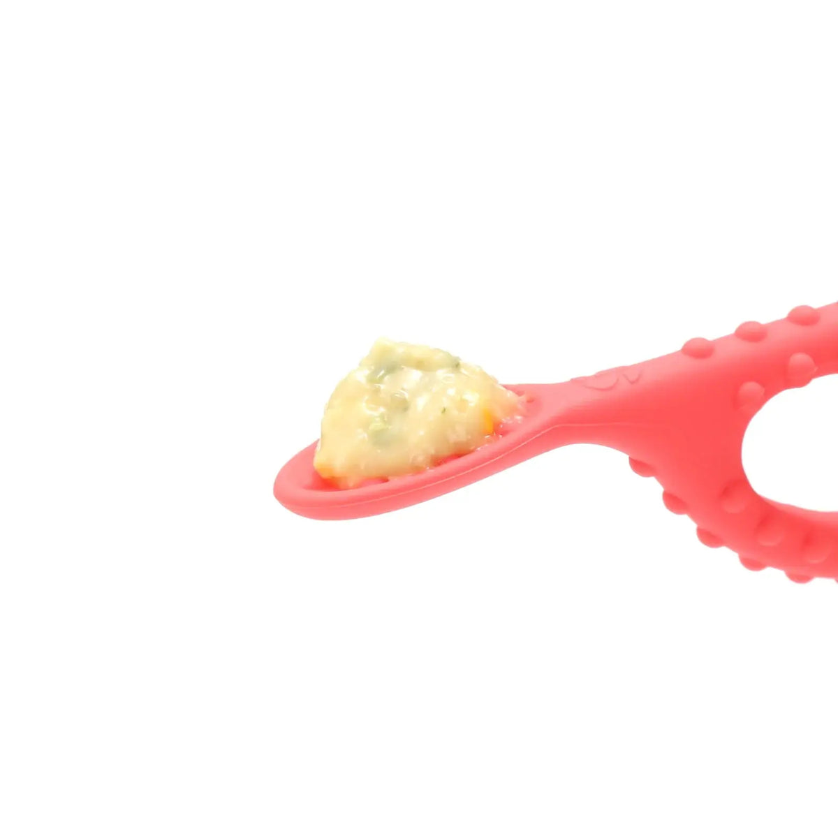 The red Textured Duo Spoon Loop holds mashed food.