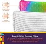 An up-close look at the sensory minky dot material and the sensory stripe material on the Dual Sided Vibrating Pillow.