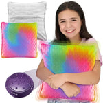A child hugs the Special Supplies Dual Sided Vibrating Pillow - Rainbow & Grey.
