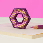 A 3D design made of Speks 432 Fidget Magnets - Bold Mix, Sassy.
