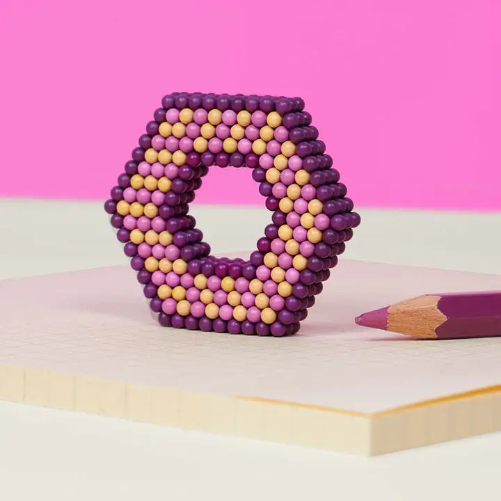 A 3D design made of Speks 432 Fidget Magnets - Bold Mix, Sassy.