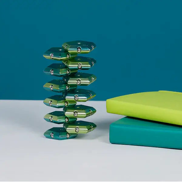 Pieces of the Speks Geode Chrome Gamma stacked vertically.