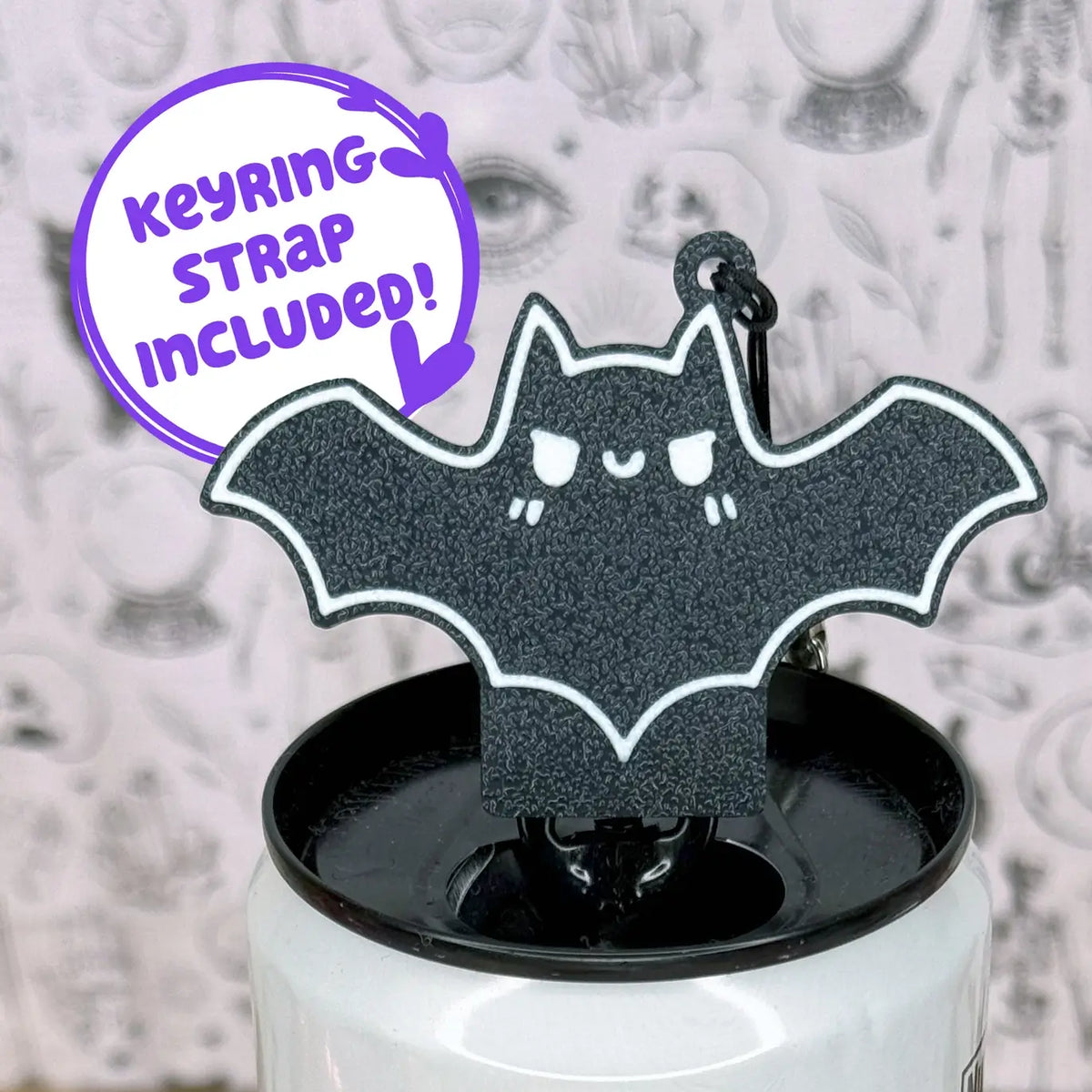 The Spicy Bat Tab Buddy on top of a can.