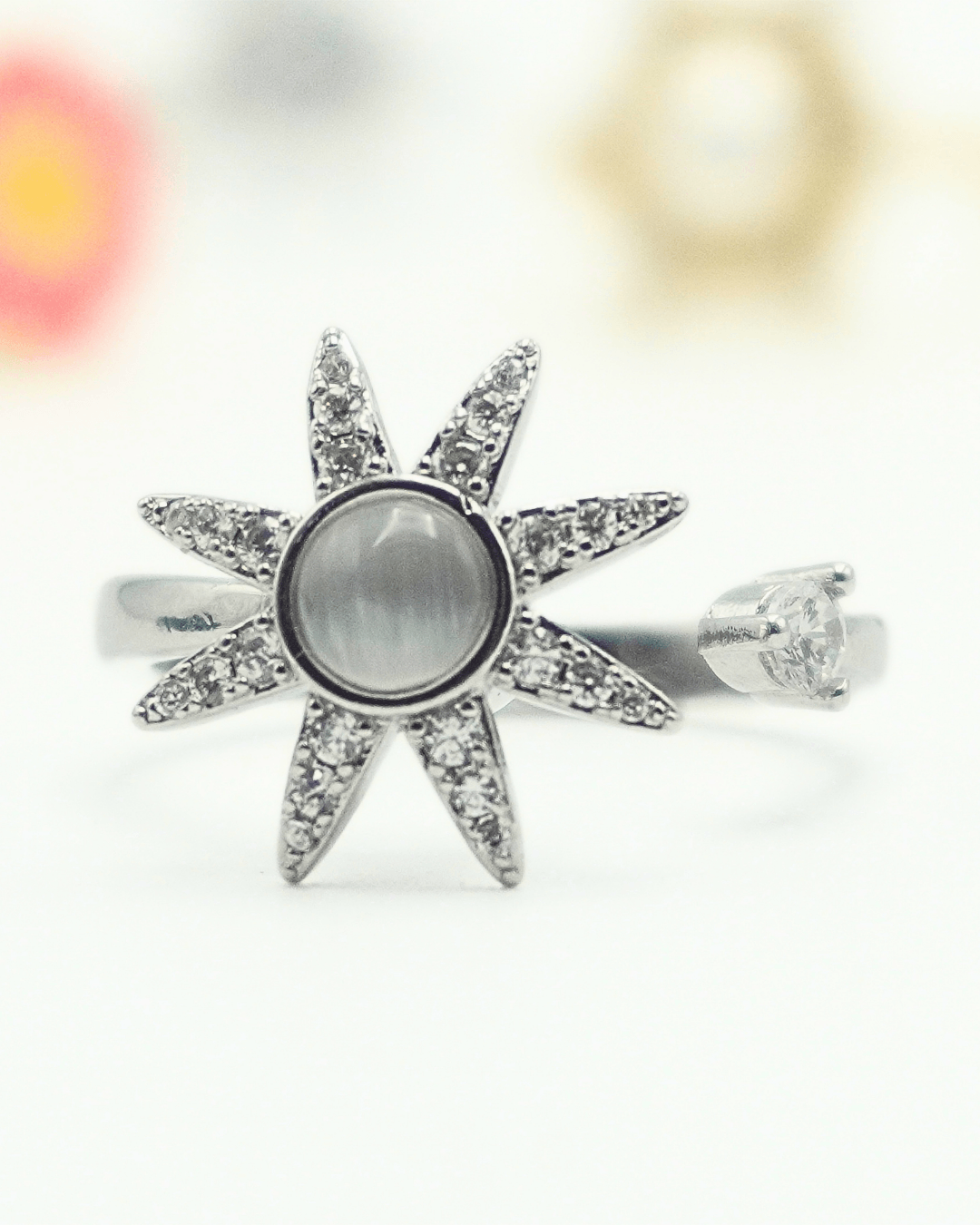 Star Moonstone Fidget Spinner Ring in Copper with Cubic Zirconia.