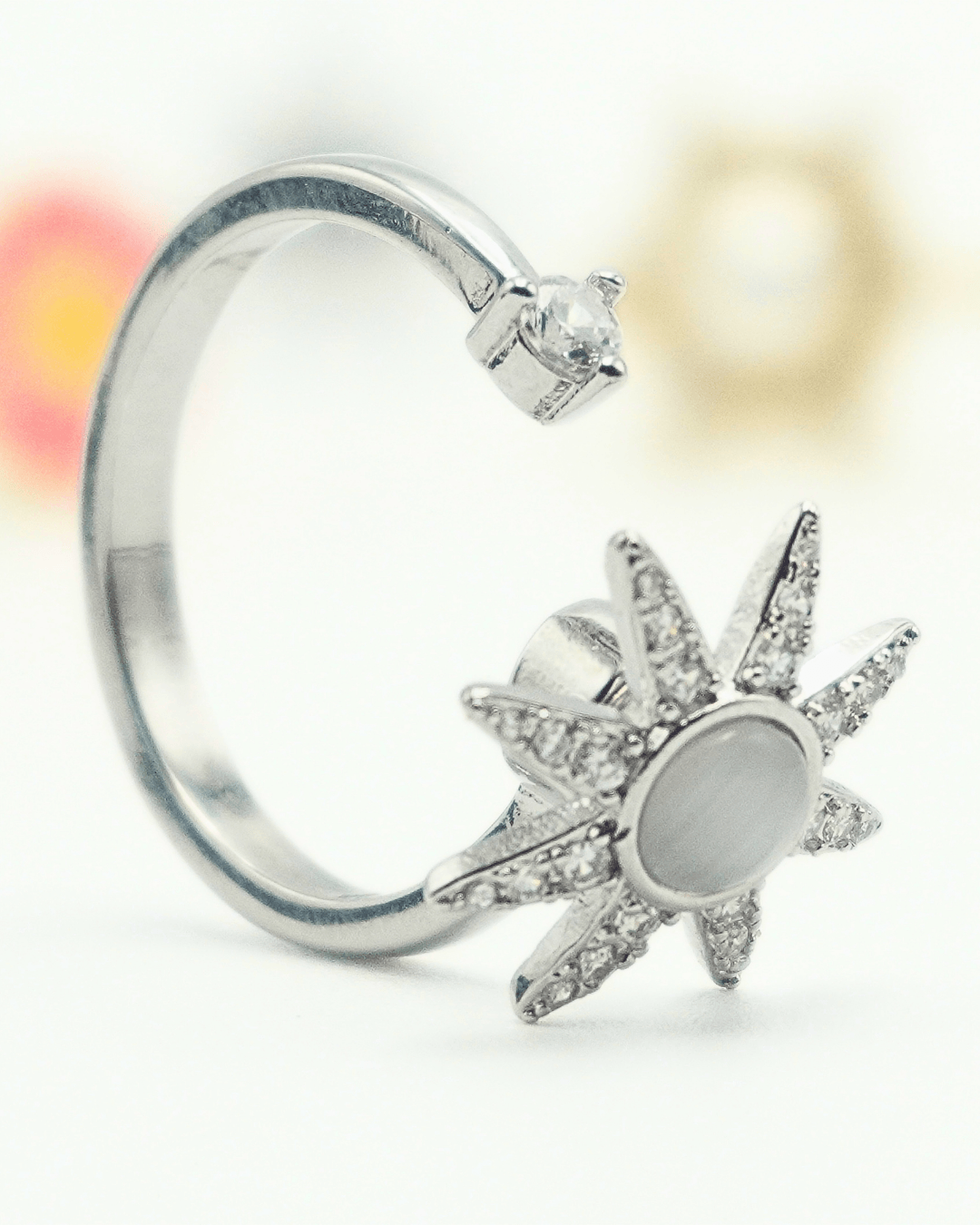 Star Moonstone Fidget Spinner Ring in Copper with Cubic Zirconia.