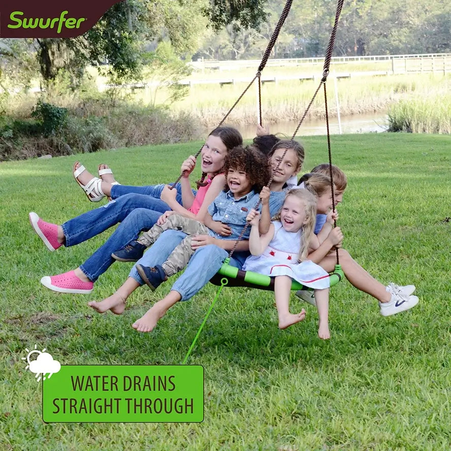 Many children all sit on the Swurfer Orbit Tree Swing as it swings back and forth.