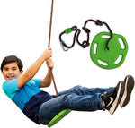 A child holds onto the rope while leaning back on the Swurfer Tree Ring Disc Swing.