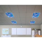 A classroom ceiling with four Calming Covers Deep Space Ceiling Light Filters.