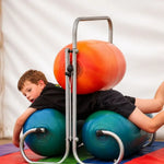 A child rolls through the TFH Squeeze Machine.