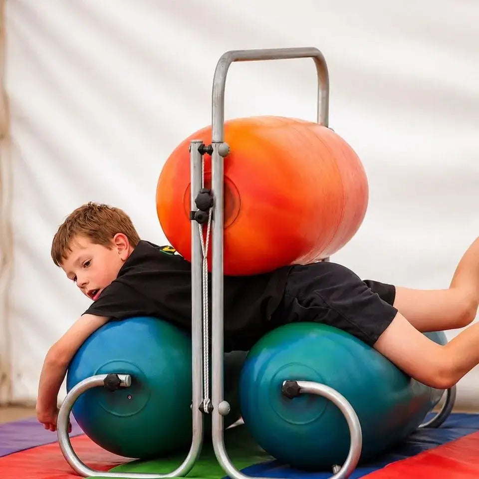 A child rolls through the TFH Squeeze Machine.
