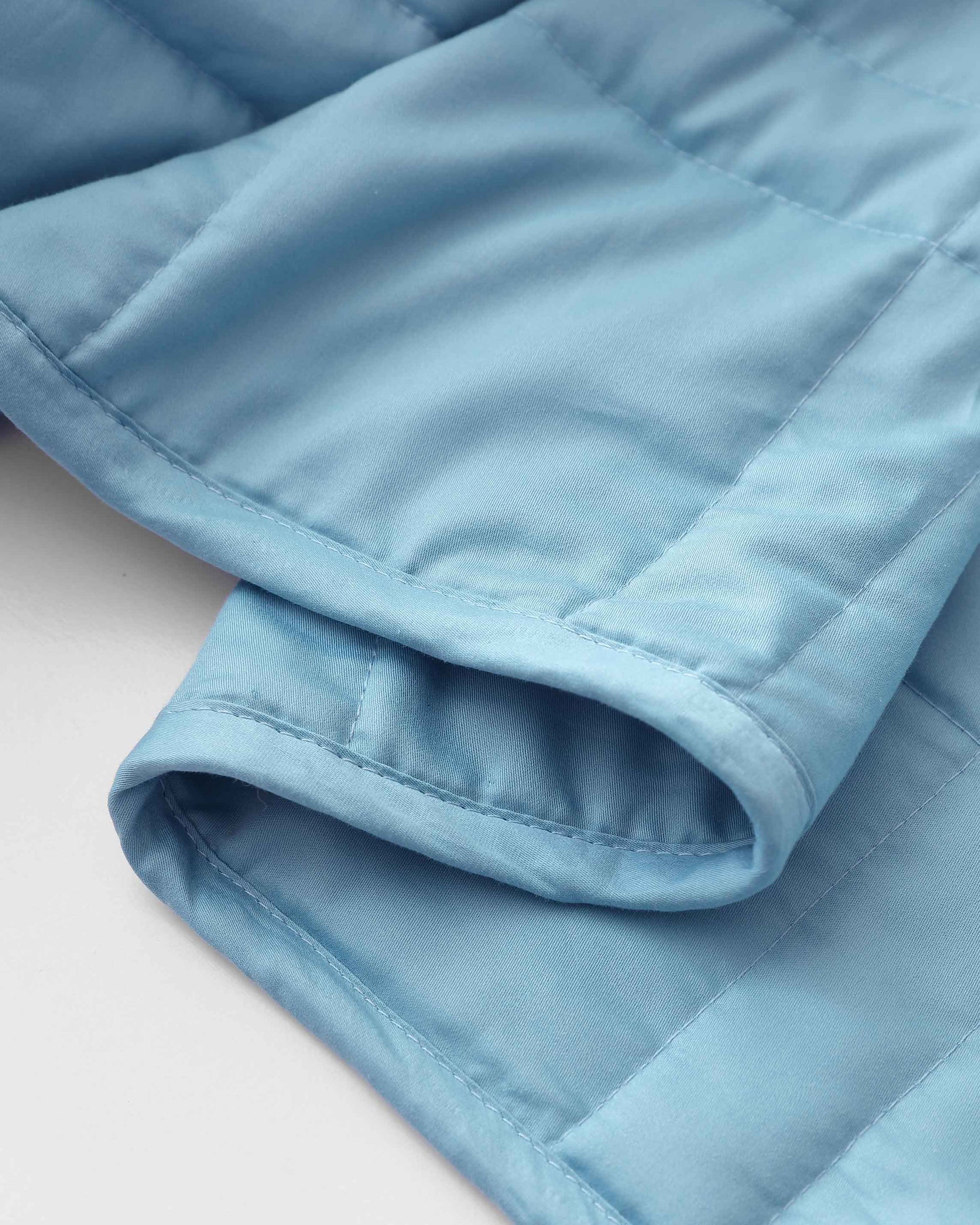 The Aqua Mini Baloo Weighted Blanket. 