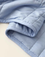 The Indigo Baloo Mini Weighted Blanket.