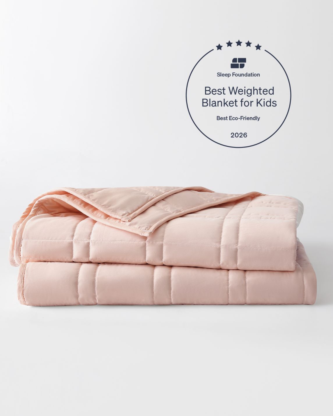 The Petal Pink Baloo Mini Weighted Blanket.