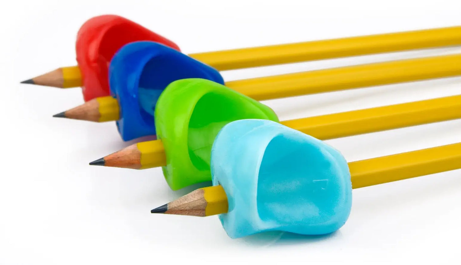 Several yellow pencils are in a line up formation with the Pinch Grip attached to them.