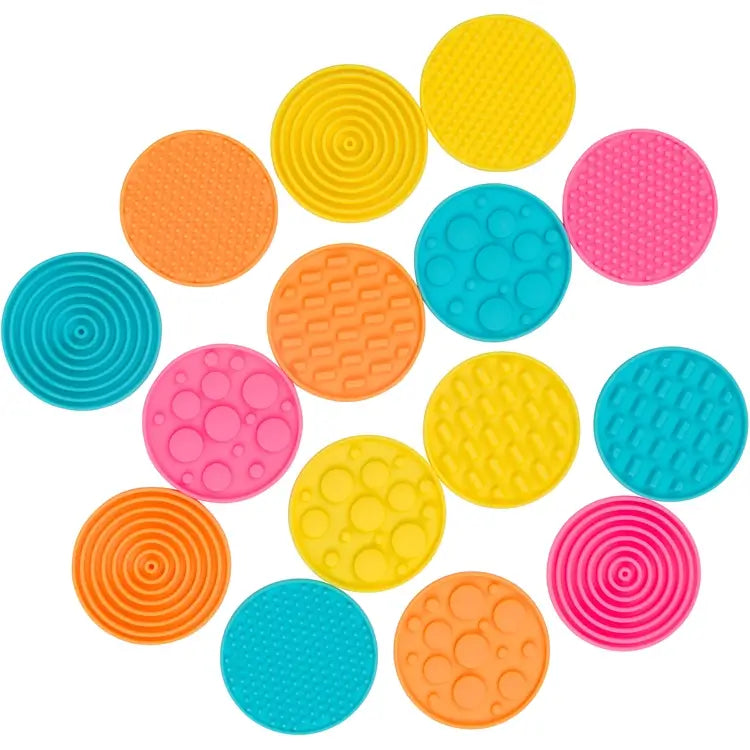 A spread of different colors and textures of the Silicone Zen Raised Dots Sensory Stickers.