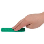 Two fingers touch the green textured Silicone Zen Raised Strip Sensory Sticker.