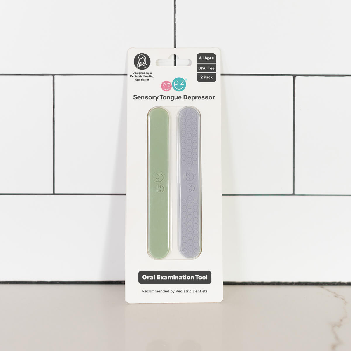 The Sage & Pewter Tongue Depressor Set in its product packaging.