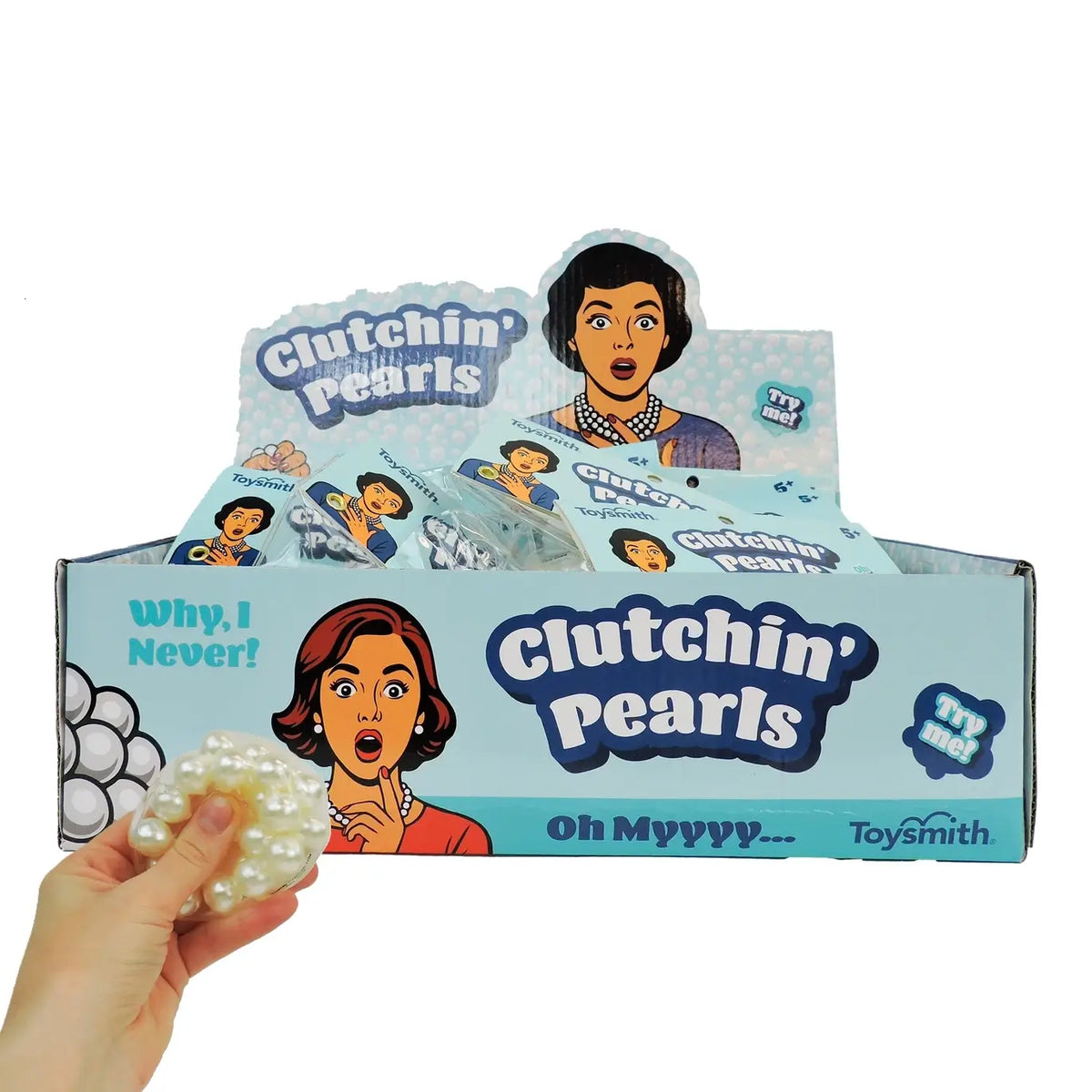 The product box behind the Toysmith Clutchin' Pearls Sensory Ball Fidget Toy.