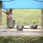 A look at the stainless steel pots and pans that come with the TP Toys Muddy Maker Mud Kitchen Outdoor Playset.