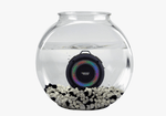 The Black Aqua Beats Waterproof Bluetooth Speaker submerged in a fish tank.
