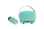 The back side of the The Pocket Karaoke Microphone & Speaker Combo Teal Bluetooth Set, revealing the charging ports.