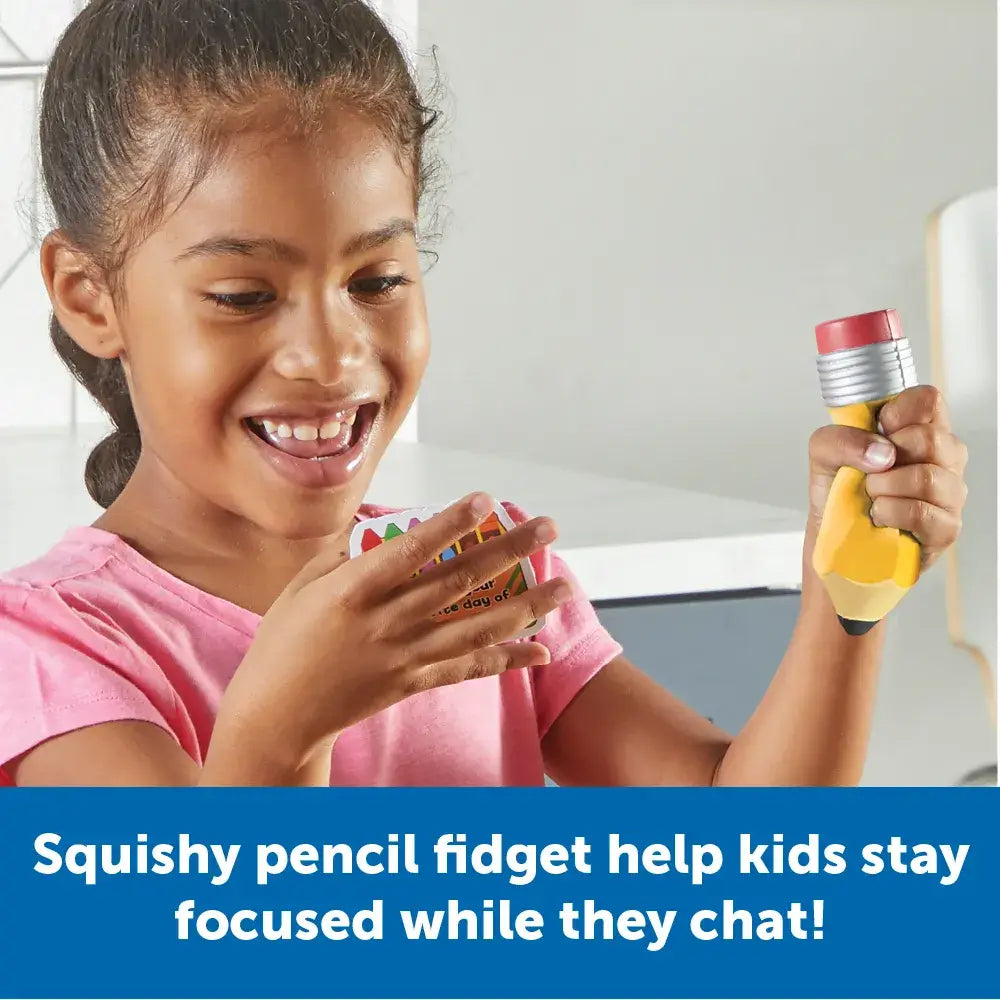 A child reads one of the conversation cards while squeezing the squishy pencil fidget.