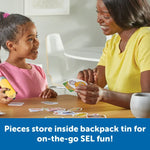 A child and her mother look at the cards together.