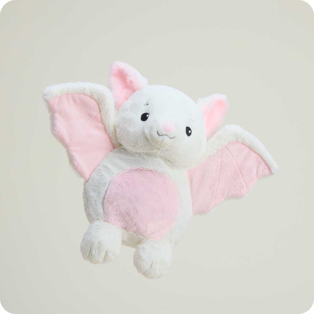 The White Bat Warmies flies through the air.