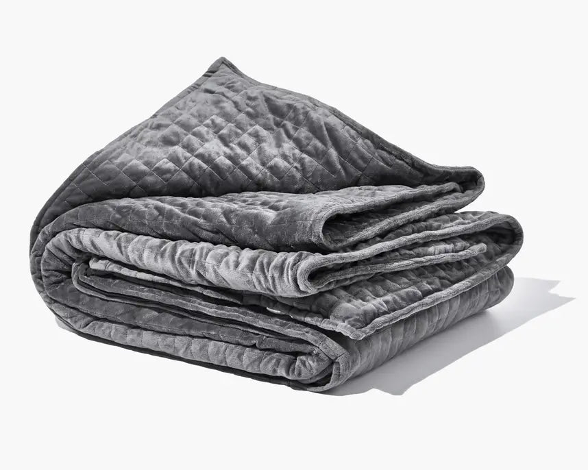 The grey Gravity Weighted Blanket (35 lbs).