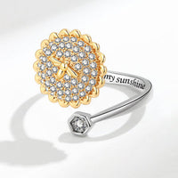 The silver Sunflower ring.