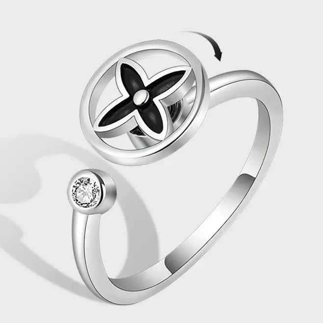 The silver Four Leaf Clover ring.