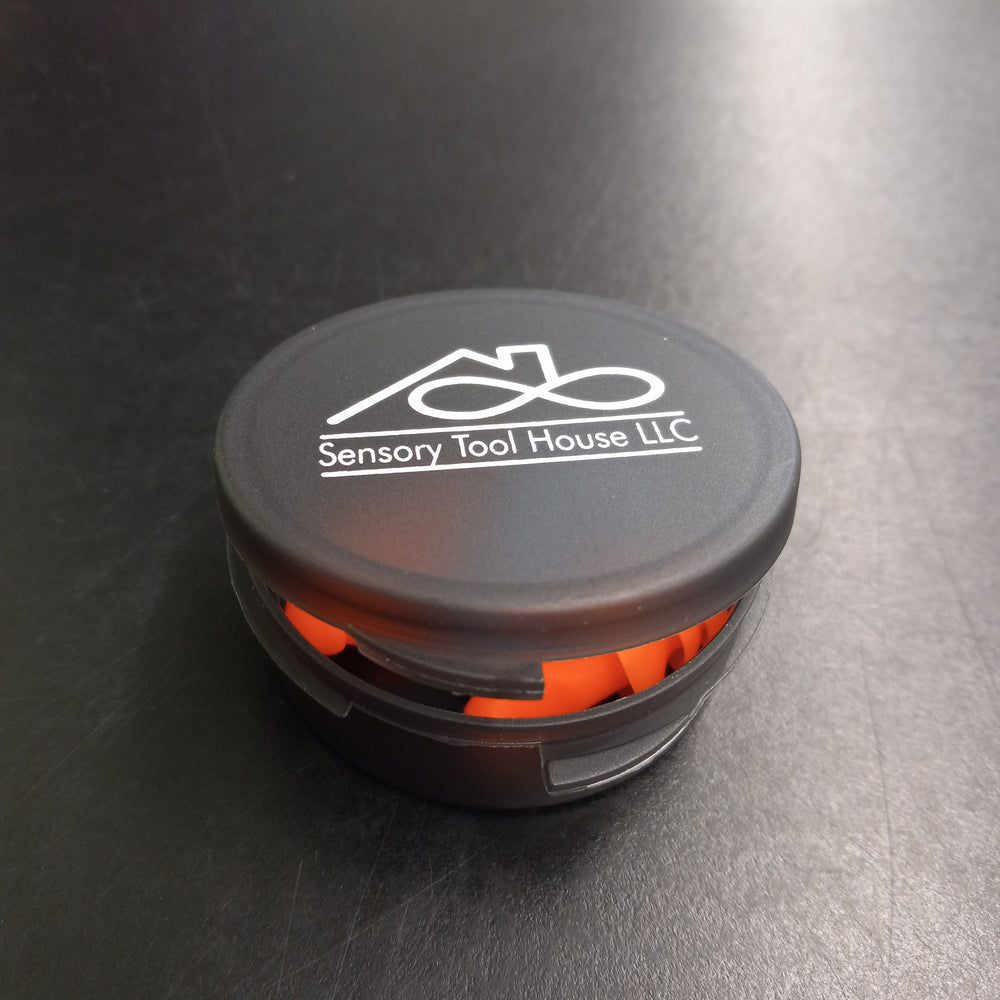 The top of the case of the Sensory Tool House Limited Edition Noise Reducing Ear Plugs.