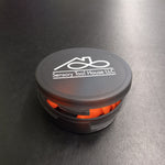 The top of the case of the Sensory Tool House Limited Edition Noise Reducing Ear Plugs.