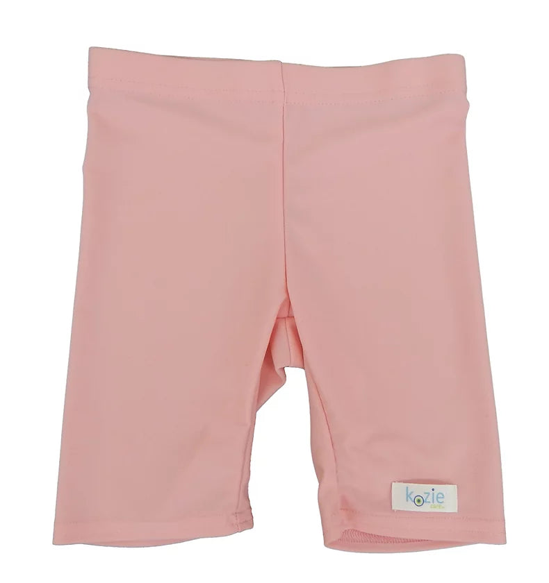 A pair of pink Unisex Sensory Compression Shorts.